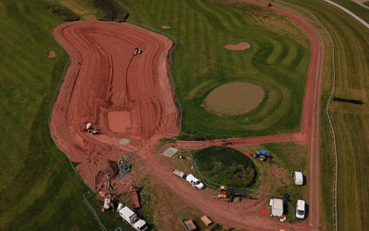 Aerial photo of a reservoir being built at the Hereford Racecourse.