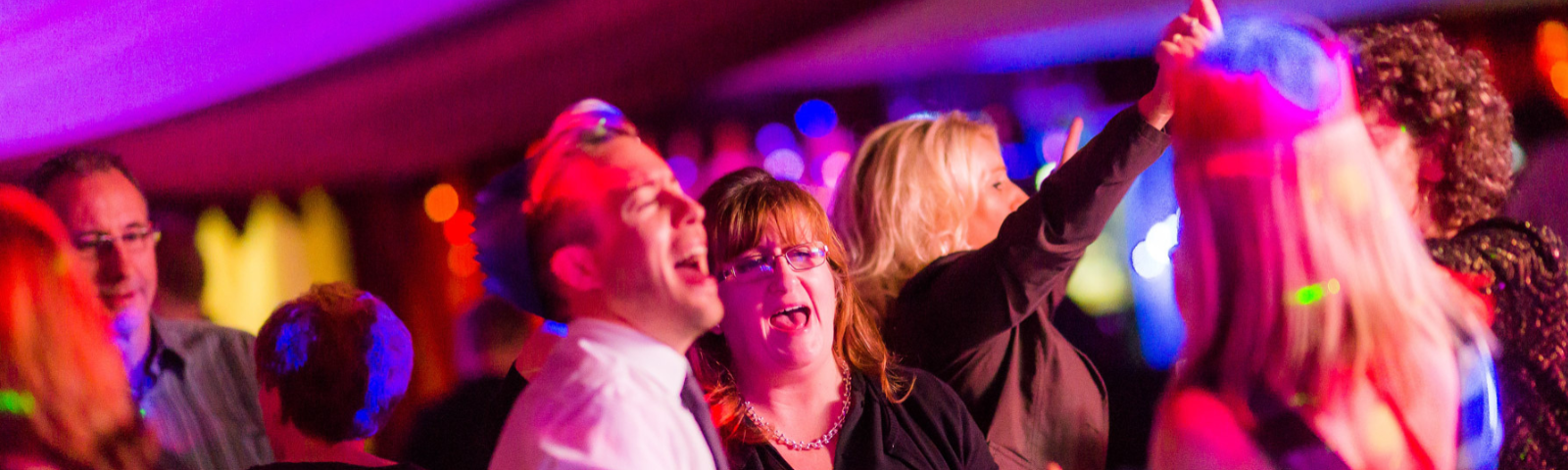 People singing along and having a great time at Hereford Christmas Parties.