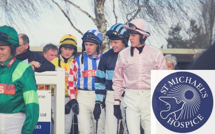 Jockeys walking through the parade ring.