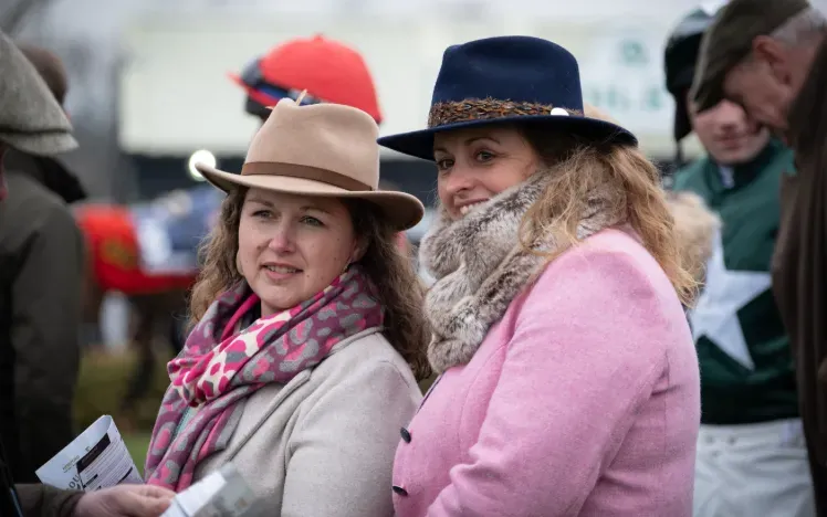 Two race goers wrapped up for the winter at Hereford Races