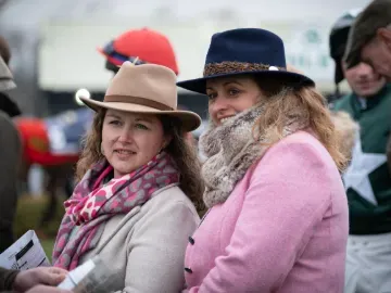 Two race goers wrapped up for the winter at Hereford Races