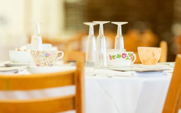 Table set for an afternoon tea.