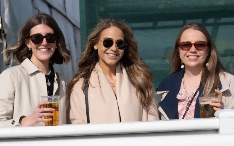 A group of ladies at Hereford Races dressed up for the cooler weather