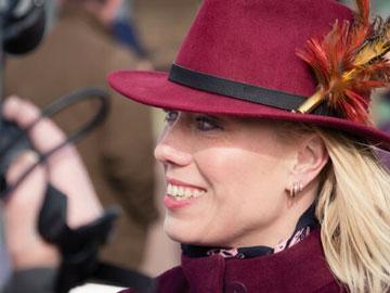 Kerry Lee posing for a photo during an interview.